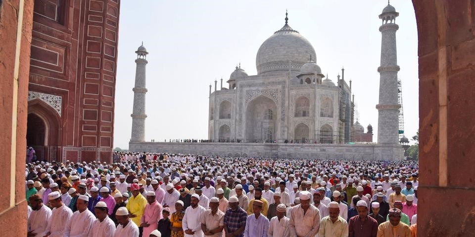  Indian Muslims offer Eid al-Fitr prayers outside the Taj Mahal in Agra, India. (AP)