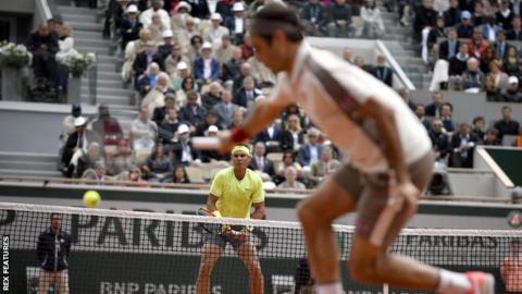 Rafael Nadal beats Roger Federer in three sets to reach French Open final