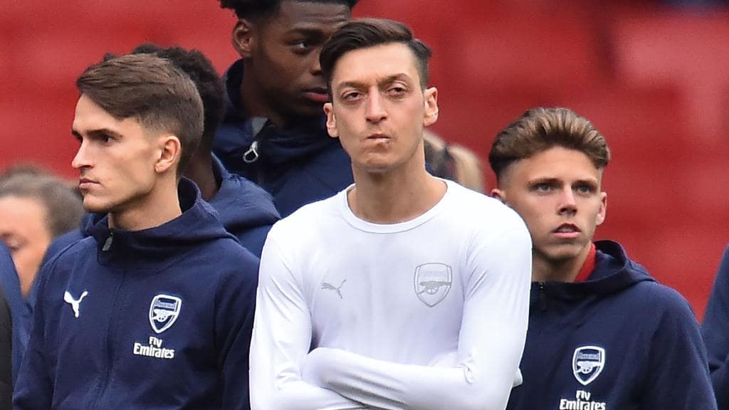 Arsenal star Mesut Ozil has been the victim of this afternoon's terrifying attempted car-jacking by a knife-wielding scooter gang on a London street. The gang boxed in the £300,000-a-year midfield ace as he drove his black Mercedes G Class 4x4 in North London. But as the thugs surrounded the car, Sead ' The Tank ' Kolasinac, Ozil's Arsenal teammate and childhood friend, jumped out and bravely took them on. In the meantime, Ozil was able to escape to a nearby restaurant where witnesses said the 30-year-old star looked ' frightened. ' Phone footage caught the squaring of Bosnian Kolasinac to one of the thieves whose face was obscured by a crash helmet. Turkish restaurant "Likya's" waiters and chefs hurried to help the football stars forcing the scooter gang to leave empty handed. During the event, none of the north London club's Premier League stars were harmed and did not require hospital treatment. Financial worker Azuka Alintah, 36, said that Ozil looked absolutely terrified, as anybody would after being chased by robbers with knives. He said that Ozil looked like he was running for his life. He saw him disappear into the restaurant with the motorcycle guys on his tail. They didn't take off their helmets and were all in black, wearing long sleeved tops in this hot weather. He said that Ozil's £100,000 vehicle with distinctive gold trim was left in the middle of the street with the driver's door open. They blocked off the highway after police came as other units were searching for the scooter gang. The brazen attack occurred close to the busy Golders Green Road in North London. After a great pre-season trip in America, Ozil and Kolasinac had just returned to London the day before. Before being permitted to leave, the pair gave their statements to the police. Ozil is the recent high-profile figure targeted by London-based knife-wielding gangs. Comedian Michael McIntyre was compelled by an armed gang to hand over his costly watch.